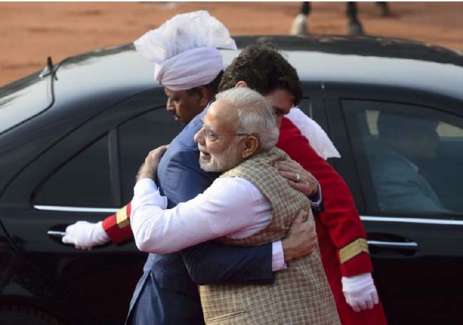 Modi Hugs Trudeau amid  Indo-Canada Invitation Embarrassment